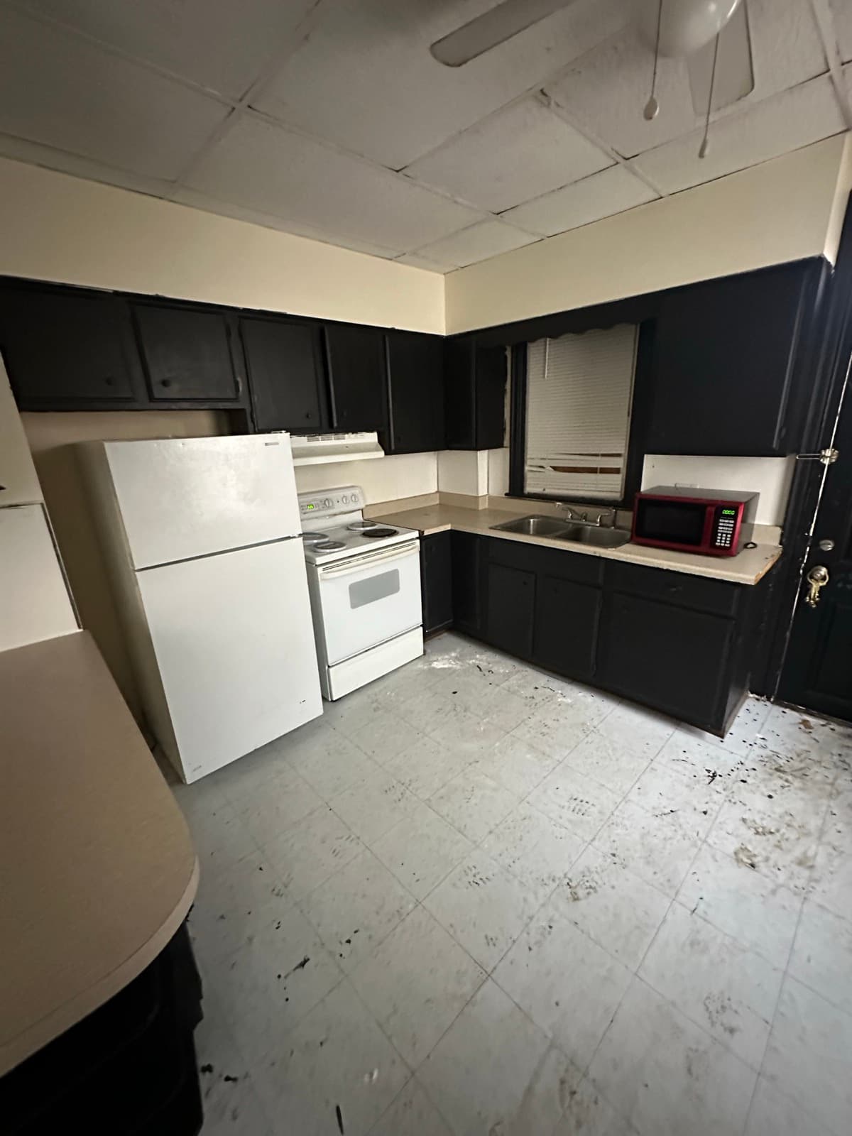 Stove and refrigerators cleared from a kitchen interior in York County, PA — The Junk Lord