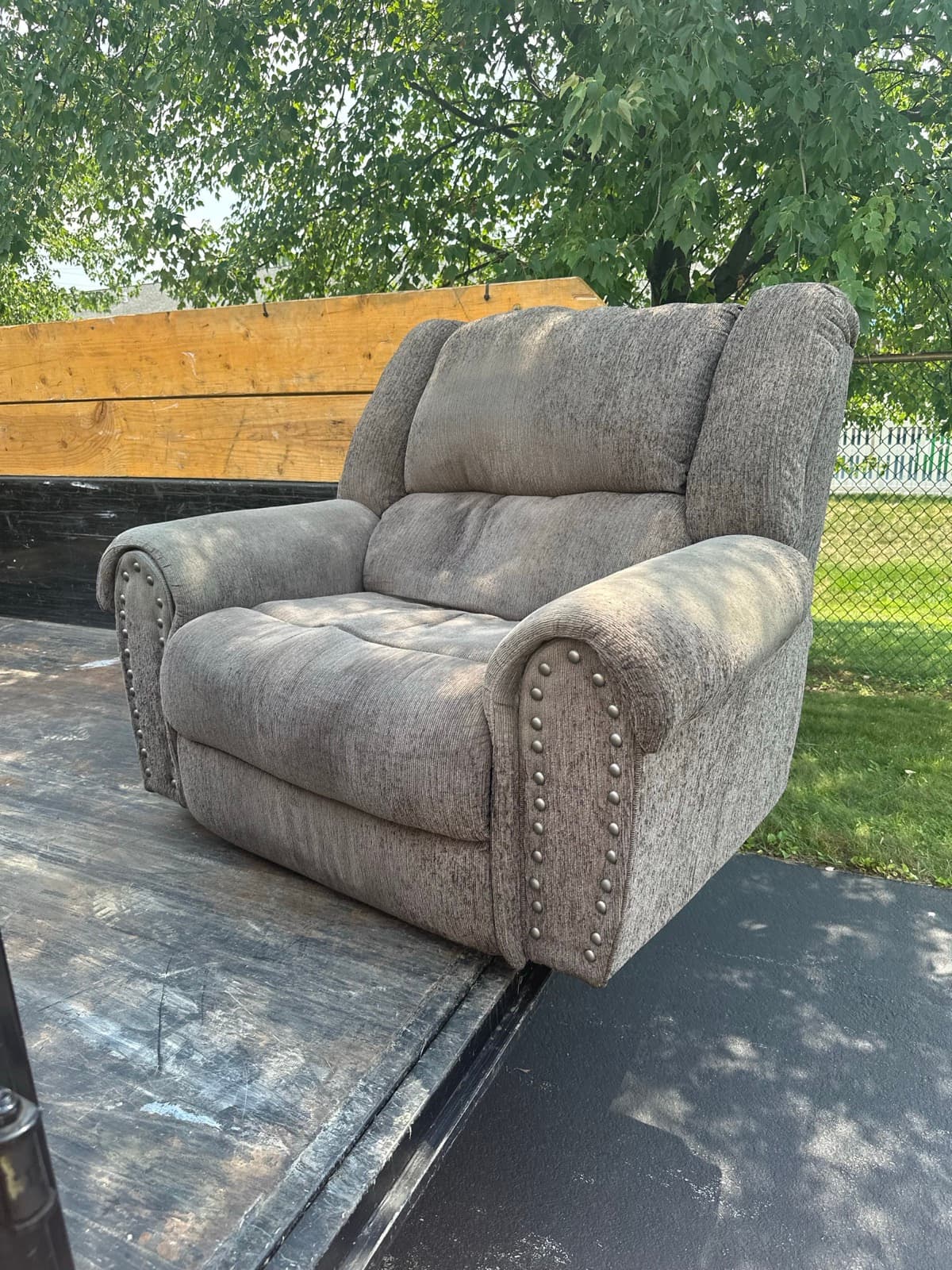 Gray sectional sofa loaded into the trailer in York County, PA — The Junk Lord