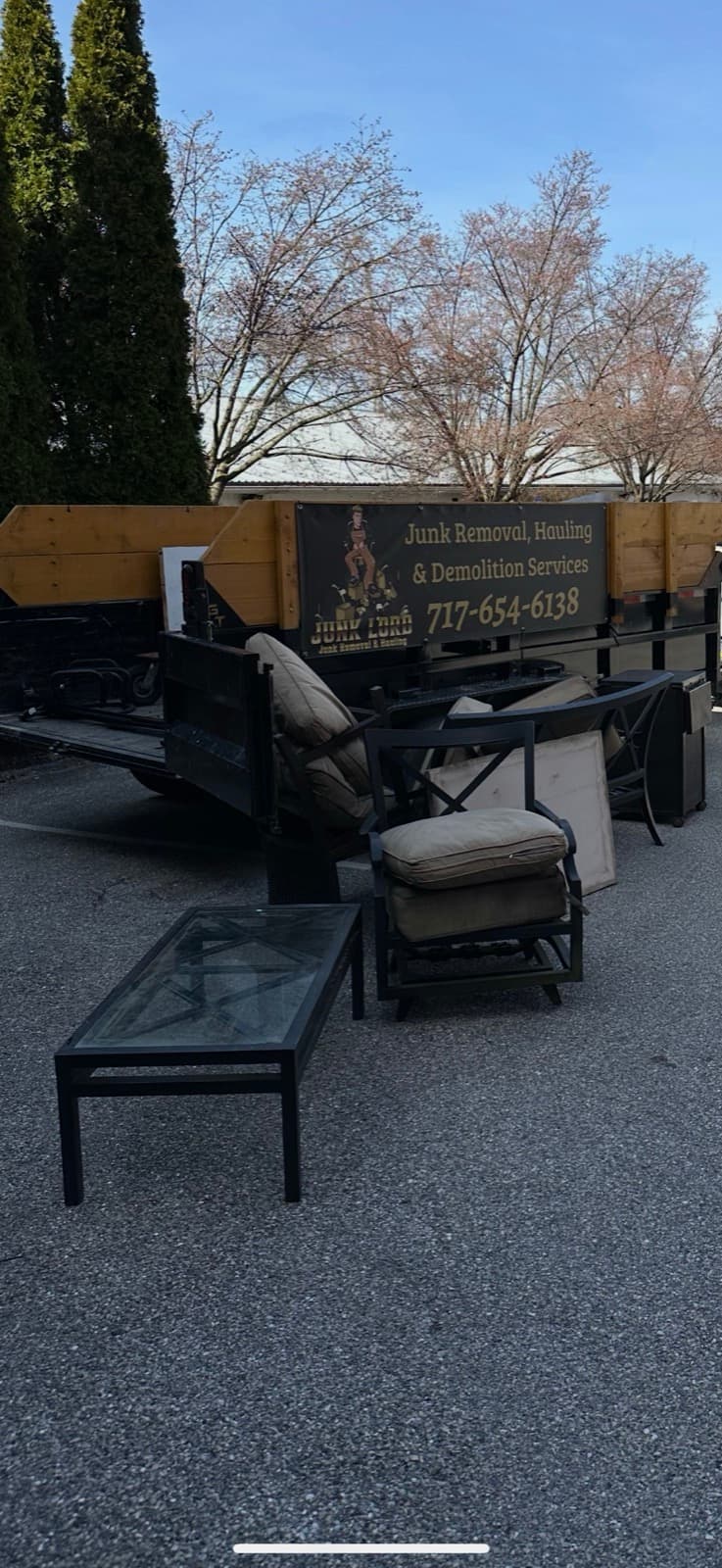 Patio chair and glass-top table on the Junk Lord trailer in York County, PA