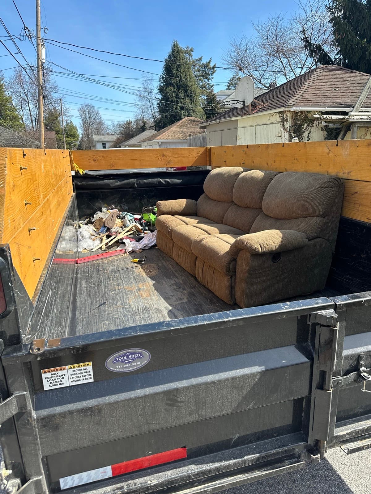 Trailer loaded with large couches and household debris in York County, PA — The Junk Lord