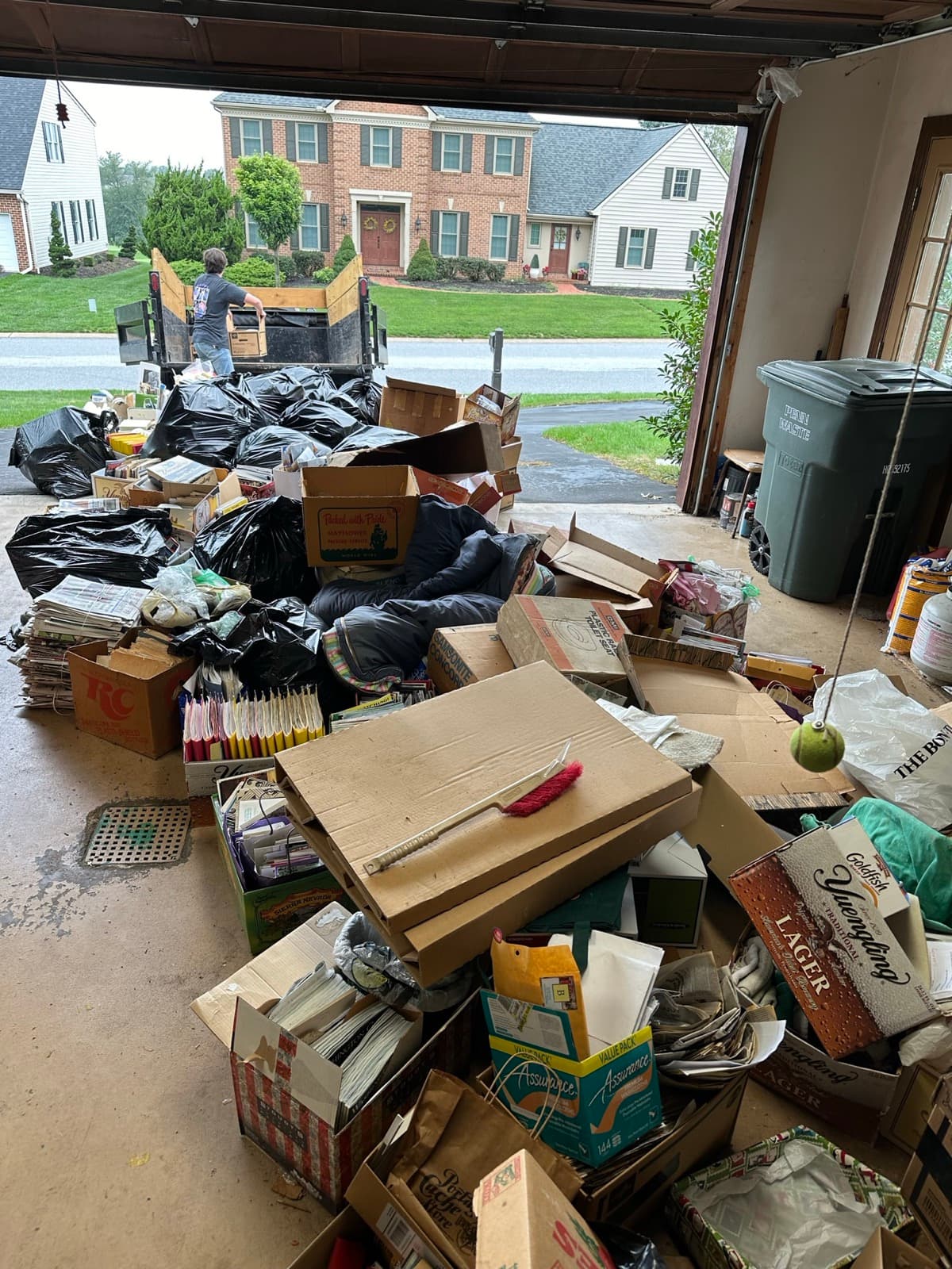 Driveway pile of boxes and bags pulled from a garage cleanout in York County, PA — The Junk Lord