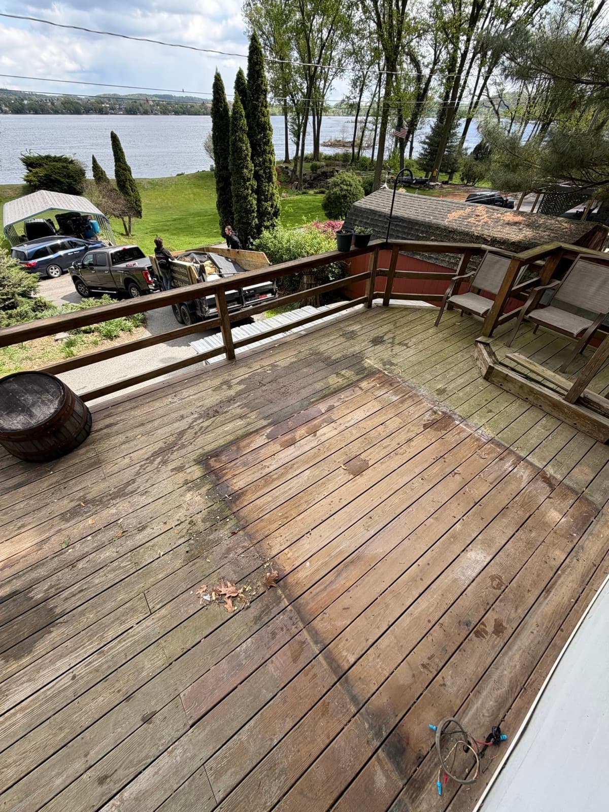 Backyard deck and exterior wall during a pool removal in York County, PA — The Junk Lord