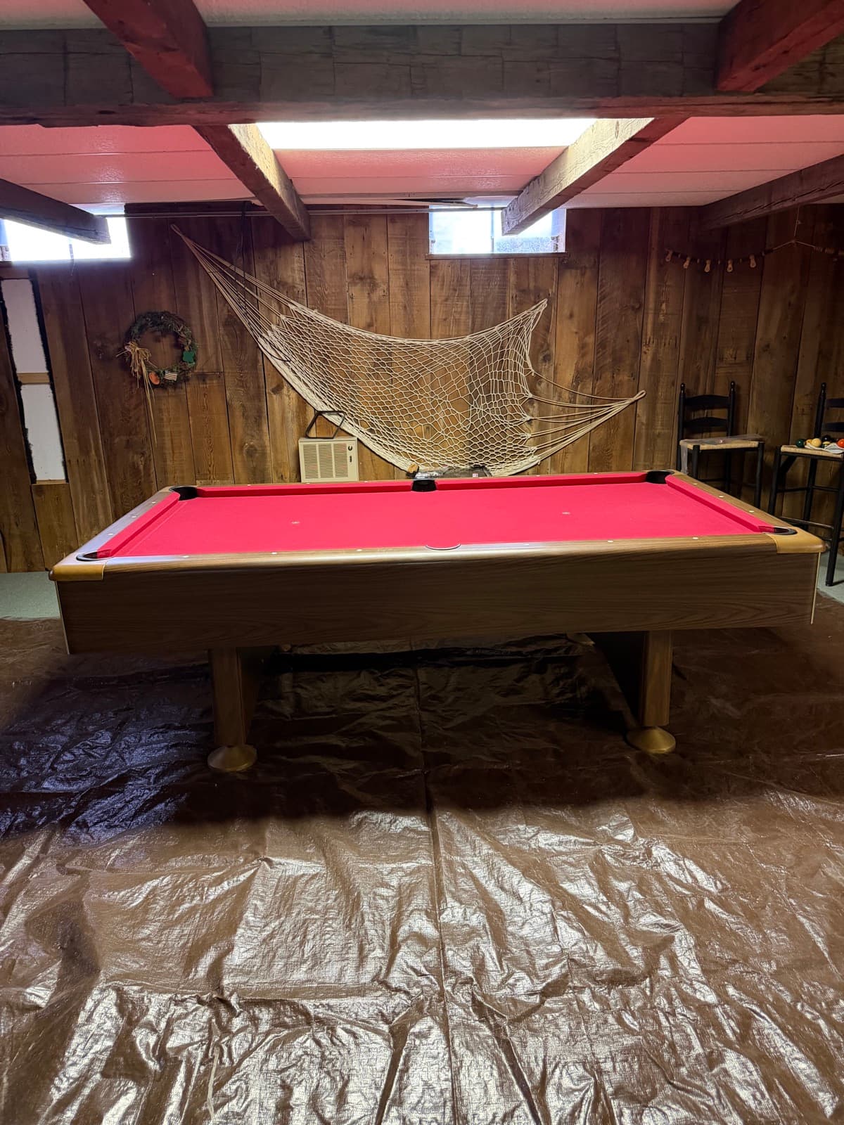 Red-felt pool table in a wood-paneled rec room slated for The Junk Lord teardown — York County