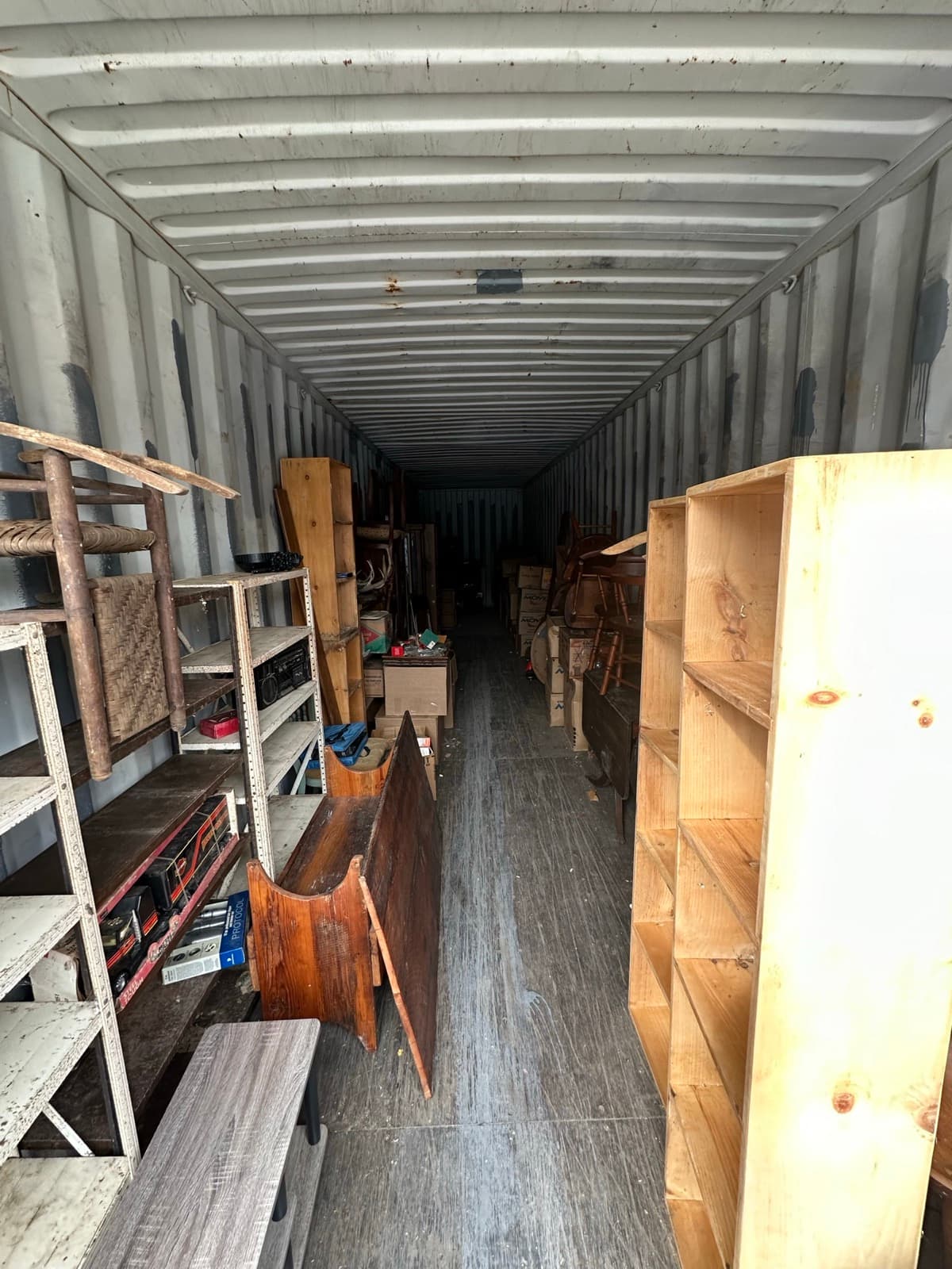 Storage container interior with stacked furniture during a cleanout in York County, PA — The Junk Lord